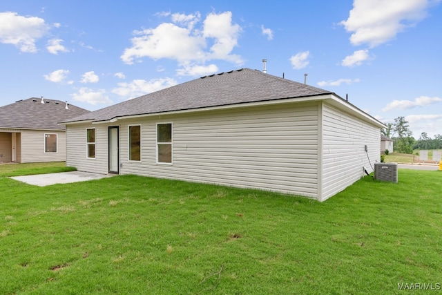 177 Canal Xing, Wetumpka, AL 36092 - rear view of property featuring a patio area, a lawn, and roof with shingles