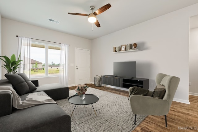 177 Canal Xing, Wetumpka, AL 36092 - living room featuring wood finished floors, baseboards, and ceiling fan