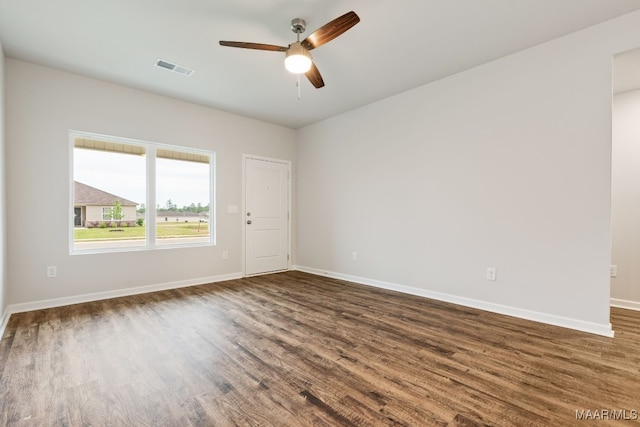 177 Canal Xing, Wetumpka, AL 36092 - empty room with dark wood finished floors, a ceiling fan, and baseboards