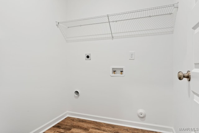 177 Canal Xing, Wetumpka, AL 36092 - laundry area featuring gas dryer hookup, baseboards, hookup for an electric dryer, washer hookup, and dark wood-type flooring