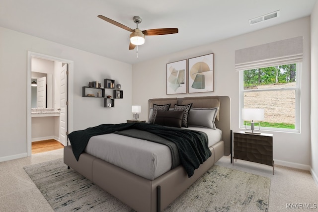 177 Canal Xing, Wetumpka, AL 36092 - bedroom featuring carpet, baseboards, ensuite bath, and ceiling fan