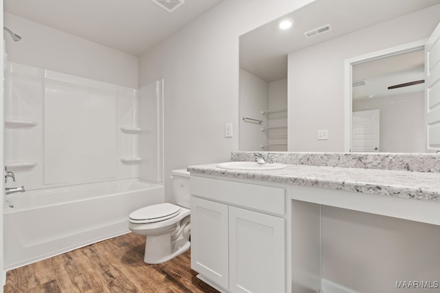 177 Canal Xing, Wetumpka, AL 36092 - full bathroom with wood finished floors, toilet, vanity, and tub / shower combination