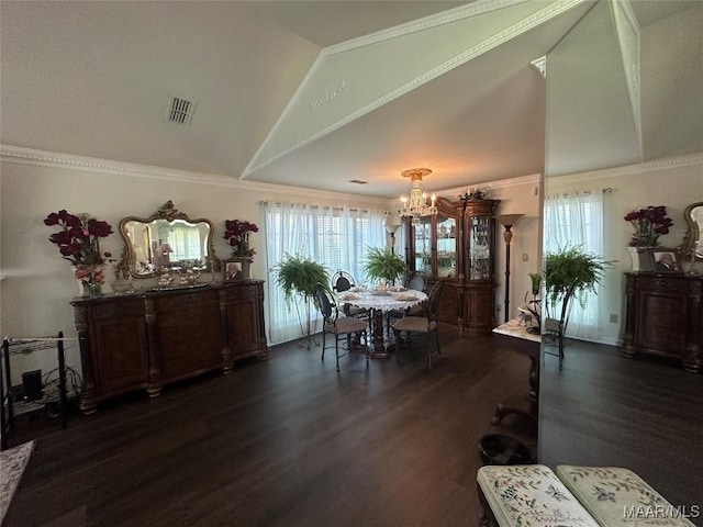 3932 Oak Ave, Montgomery, AL 36109 - dining room featuring a chandelier, high vaulted ceiling, and dark wood finished floors
