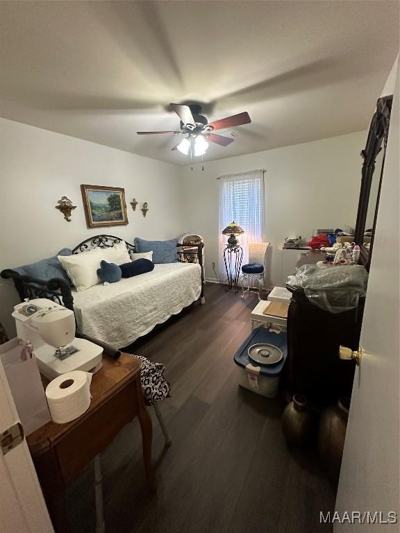 3932 Oak Ave, Montgomery, AL 36109 - bedroom with dark wood finished floors and a ceiling fan