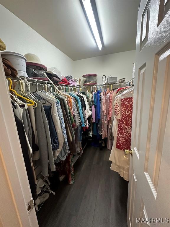 3932 Oak Ave, Montgomery, AL 36109 - walk in closet with dark wood-type flooring