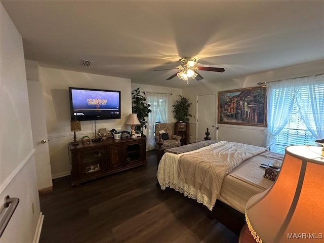 3932 Oak Ave, Montgomery, AL 36109 - bedroom with dark wood-style flooring and ceiling fan