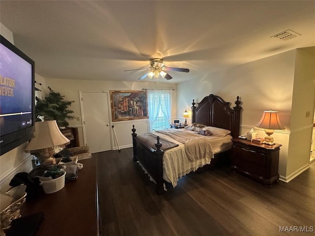3932 Oak Ave, Montgomery, AL 36109 - bedroom with dark wood-style floors and ceiling fan