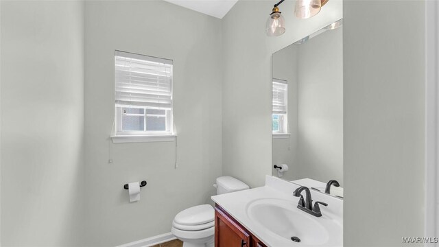 8 Honor Dr, Fort Mitchell, AL 36856 - bathroom featuring toilet, vanity, and baseboards