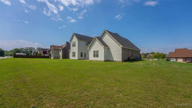8 Honor Dr, Fort Mitchell, AL 36856 - view of side of home with central AC unit and a lawn