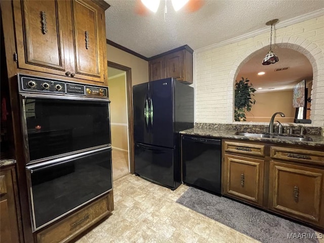 1003 Keith Way, Selma, AL 36701 - kitchen with black appliances, ornamental molding, a sink, ceiling fan, and arched walkways
