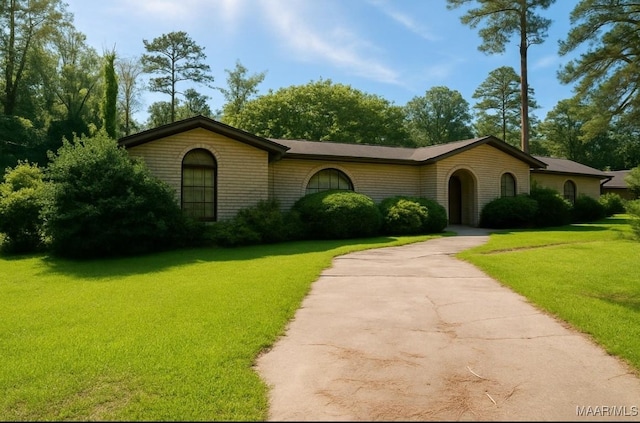 1003 Keith Way, Selma, AL 36701 - ranch-style house with a front lawn