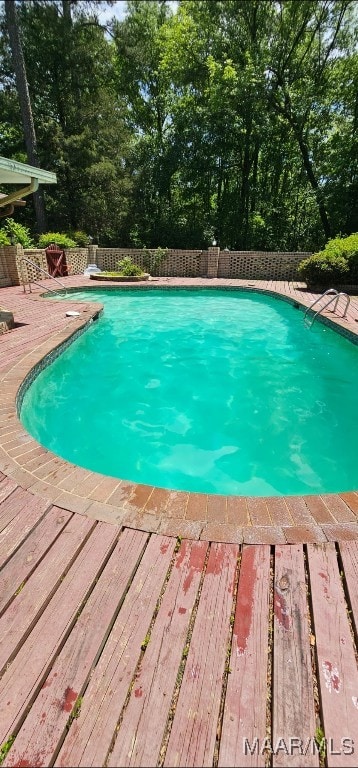 1003 Keith Way, Selma, AL 36701 - view of pool with a wooden deck