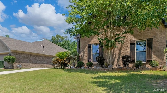 9148 Autumnbrooke Way, Montgomery, AL 36117 - view of front of house with brick siding and a front lawn