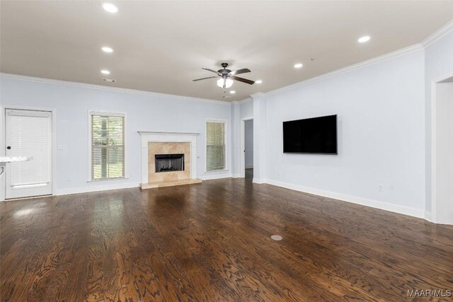 9148 Autumnbrooke Way, Montgomery, AL 36117 - unfurnished living room featuring a ceiling fan, ornamental molding, recessed lighting, baseboards, and a tiled fireplace