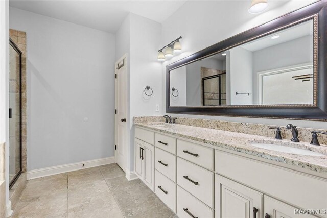 9148 Autumnbrooke Way, Montgomery, AL 36117 - full bath with double vanity, a shower stall, and baseboards