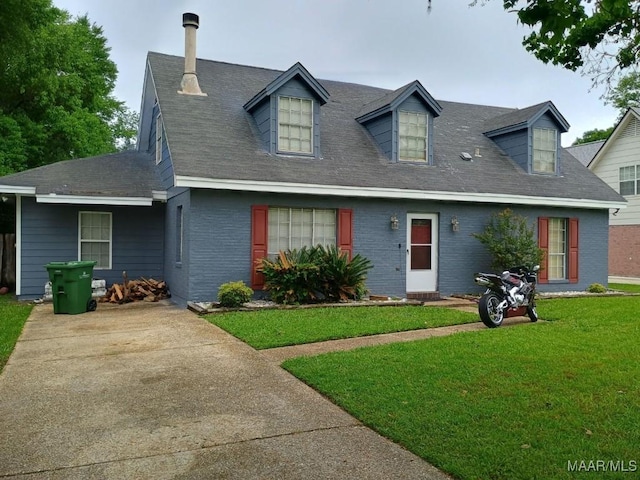 2276 E Aberdeen Dr, Montgomery, AL 36116 - cape cod-style house with brick siding, a front yard, and a shingled roof