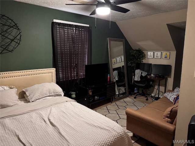 2276 E Aberdeen Dr, Montgomery, AL 36116 - bedroom with a textured ceiling, lofted ceiling, ceiling fan, and an office area