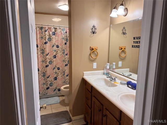 2276 E Aberdeen Dr, Montgomery, AL 36116 - bathroom featuring tile patterned flooring, double vanity, toilet, and a shower with curtain