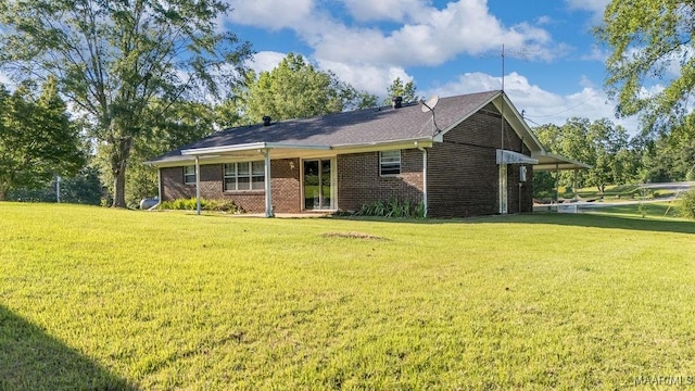5241 County Road 48th Rd, Jemison, AL 35085 - view of front of home featuring a front yard and brick siding