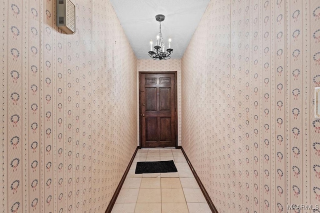 5241 County Road 48th Rd, Jemison, AL 35085 - doorway featuring wallpapered walls, a chandelier, and tile patterned flooring