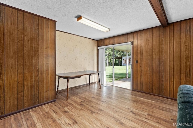 5241 County Road 48th Rd, Jemison, AL 35085 - unfurnished dining area featuring wood finished floors, a textured ceiling, and wood walls