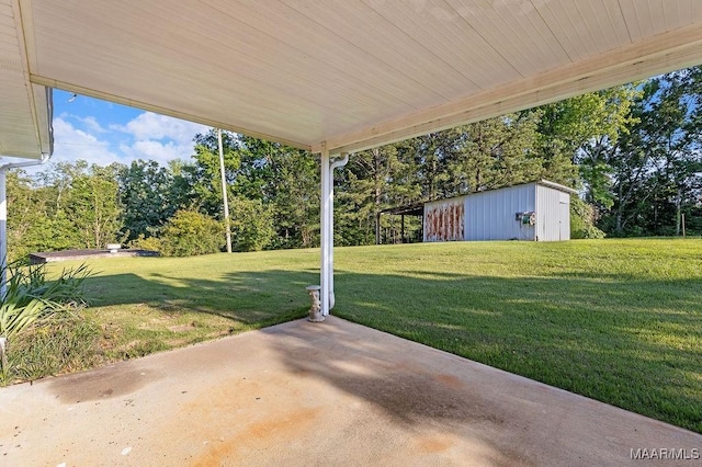 5241 County Road 48th Rd, Jemison, AL 35085 - view of patio with an outdoor structure and view of scattered trees