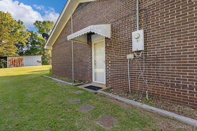 5241 County Road 48th Rd, Jemison, AL 35085 - property entrance with a yard and brick siding