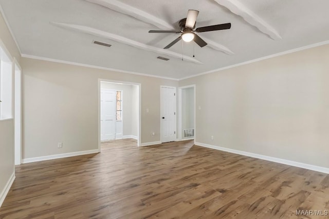 302 Janice St, Prattville, AL 36066 - spare room featuring ornamental molding, ceiling fan, wood finished floors, and baseboards