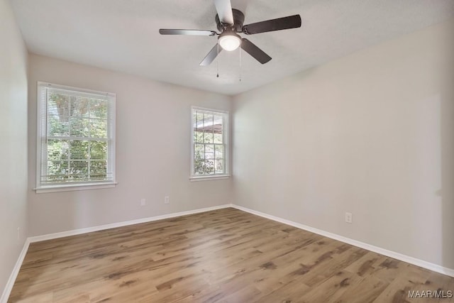 302 Janice St, Prattville, AL 36066 - empty room with wood finished floors, baseboards, and a ceiling fan