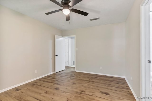 302 Janice St, Prattville, AL 36066 - spare room featuring a ceiling fan, wood finished floors, and baseboards