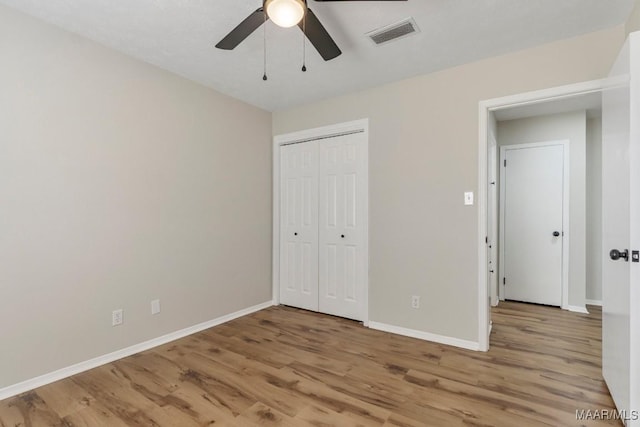 302 Janice St, Prattville, AL 36066 - unfurnished bedroom with wood finished floors, baseboards, a closet, and ceiling fan