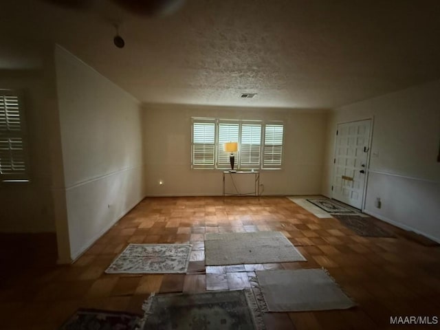 2700 W Edgemont Ave, Montgomery, AL 36108 - foyer featuring a textured ceiling