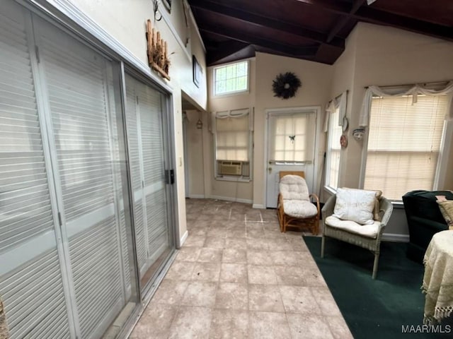 2700 W Edgemont Ave, Montgomery, AL 36108 - sunroom / solarium with beamed ceiling, cooling unit, baseboards, and high vaulted ceiling
