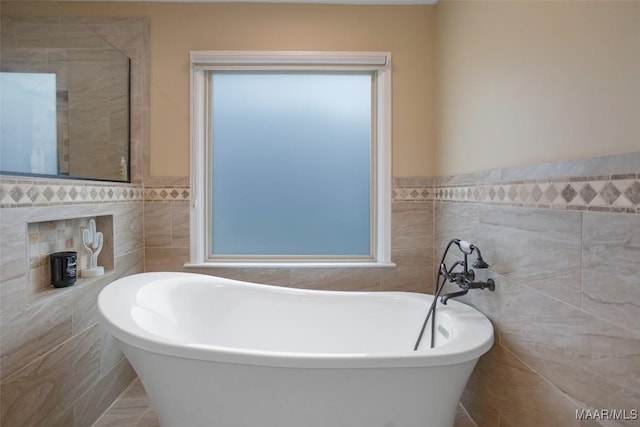8945 Chantilly Way, Montgomery, AL 36116 - full bath featuring tile walls, a soaking tub, and a wainscoted wall