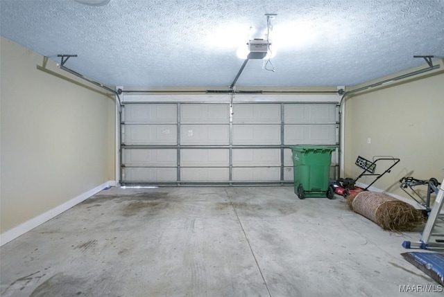 8945 Chantilly Way, Montgomery, AL 36116 - garage with baseboards and a garage door opener
