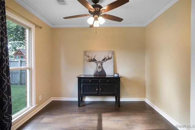 8945 Chantilly Way, Montgomery, AL 36116 - detailed view of wood finished floors, crown molding, baseboards, and ceiling fan