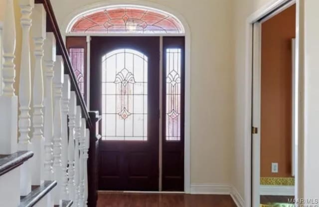 103 River Chase Ct, Wetumpka, AL 36092 - entrance foyer featuring stairway and baseboards