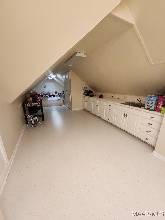 103 River Chase Ct, Wetumpka, AL 36092 - bonus room featuring a sink, lofted ceiling, and baseboards