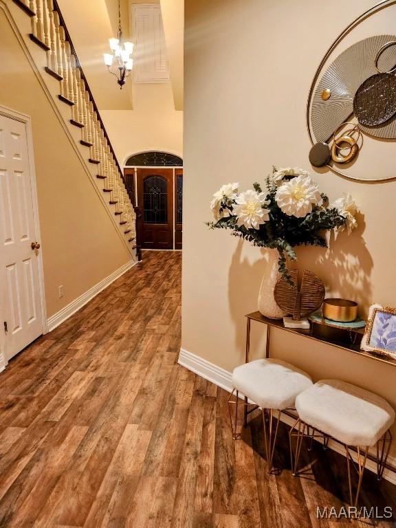 103 River Chase Ct, Wetumpka, AL 36092 - corridor with baseboards, wood finished floors, and stairs