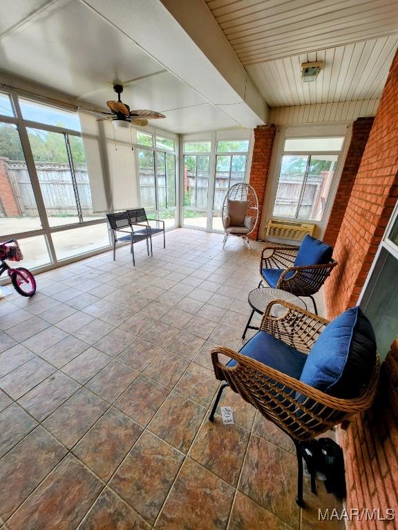103 River Chase Ct, Wetumpka, AL 36092 - sunroom with ceiling fan and a water view