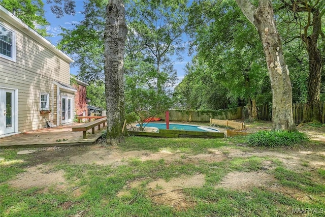 184 Fox Hollow Rd, Montgomery, AL 36109 - fenced backyard with french doors and a wooden deck