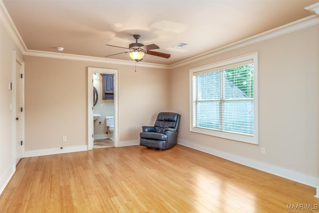 8460 Rockbridge Cir, Montgomery, AL 36116 - unfurnished room featuring light wood-style floors, crown molding, ceiling fan, and baseboards