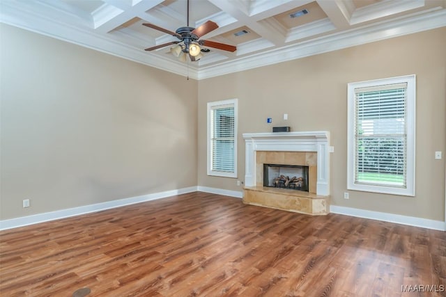 8460 Rockbridge Cir, Montgomery, AL 36116 - unfurnished living room with coffered ceiling, crown molding, ceiling fan, a tiled fireplace, and wood finished floors