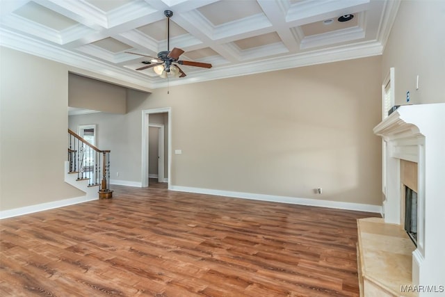 8460 Rockbridge Cir, Montgomery, AL 36116 - unfurnished living room featuring coffered ceiling, crown molding, wood finished floors, ceiling fan, and a premium fireplace