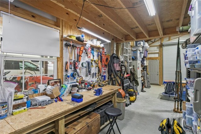 13871 Old Pike Rd, Mathews, AL 36052 - miscellaneous room with a workshop area and concrete floors