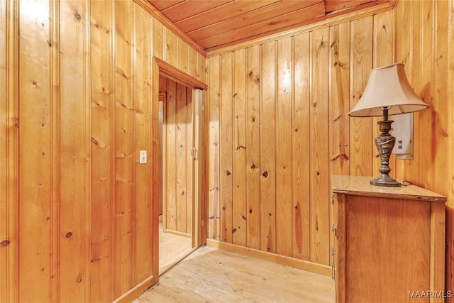 300 Elmore Rd, Titus, AL 36080 - hall with light wood-type flooring, wood walls, and wood ceiling