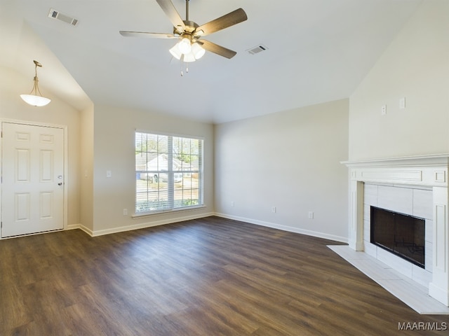 2039 Dawsons Mill Loop, Prattville, AL 36067 - unfurnished living room with lofted ceiling, dark wood-style floors, ceiling fan, baseboards, and a tiled fireplace