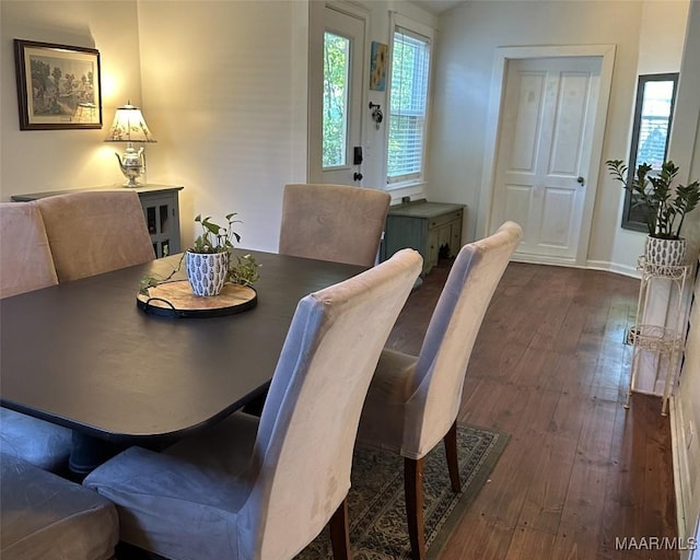 408 W Tuskeena St, Wetumpka, AL 36092 - dining space featuring dark wood-style flooring and baseboards