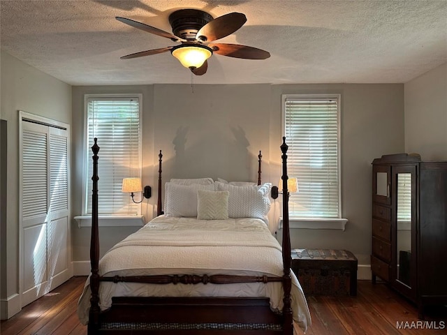 408 W Tuskeena St, Wetumpka, AL 36092 - bedroom featuring a textured ceiling, hardwood / wood-style floors, baseboards, ceiling fan, and a closet