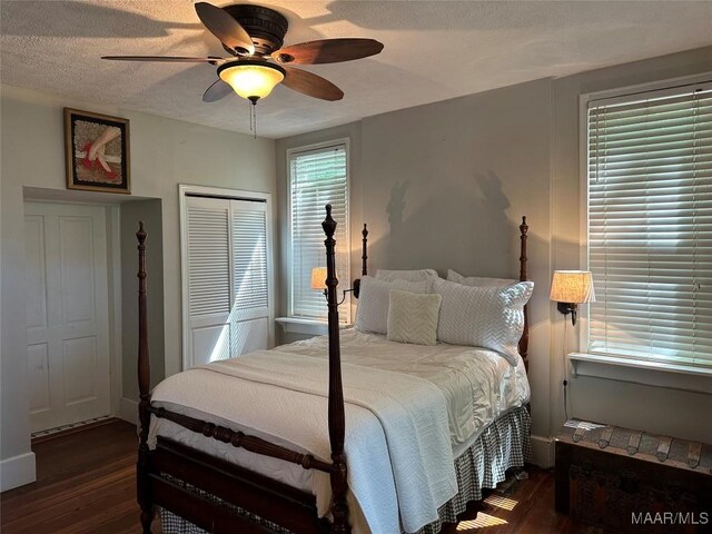 408 W Tuskeena St, Wetumpka, AL 36092 - bedroom featuring wood finished floors, a closet, a ceiling fan, and a textured ceiling